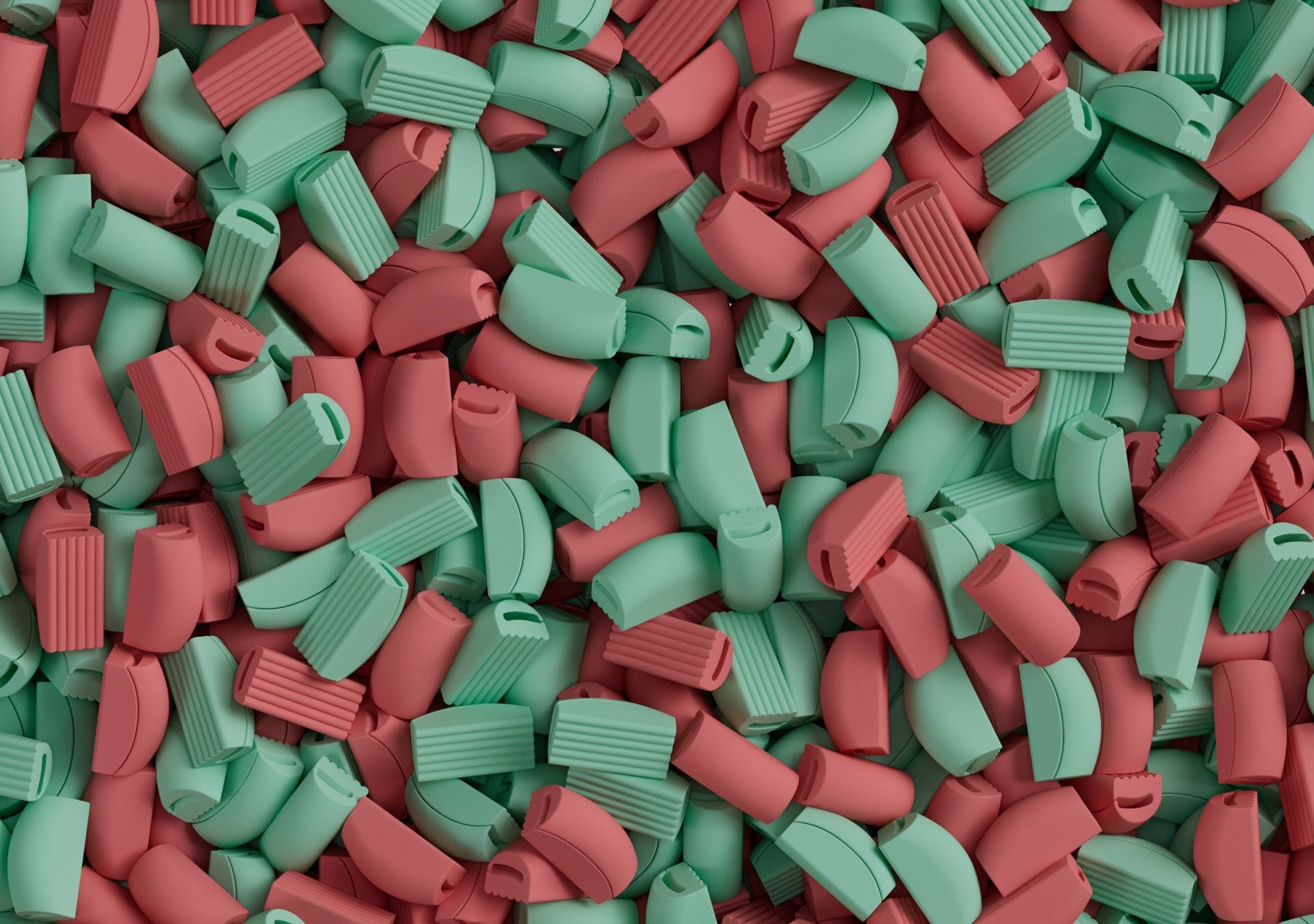 Close-up of red and green plastic shapes.